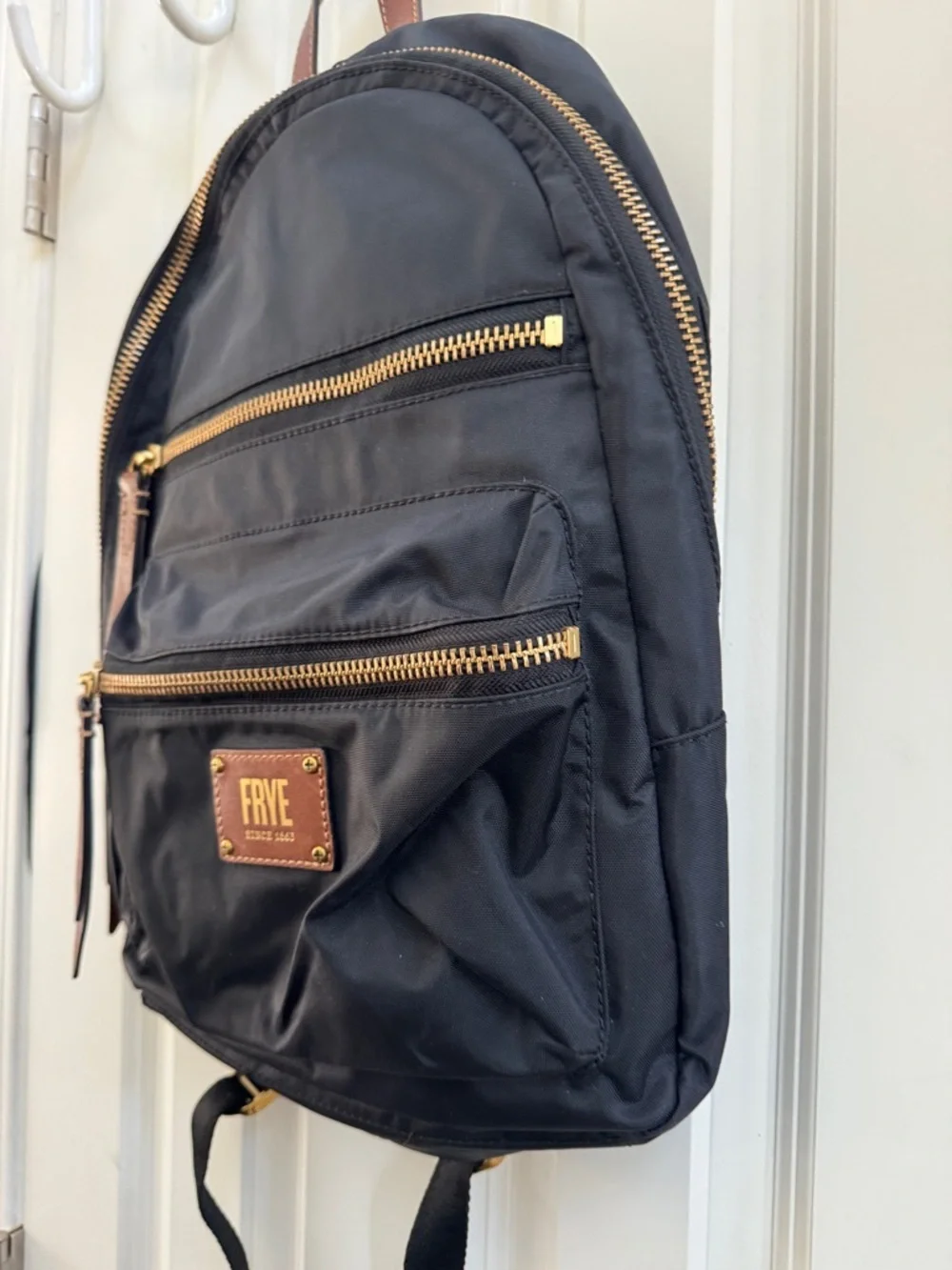 Frye Black Backpack with Brown Leather Accents and Gold Hardware